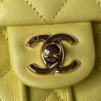 Cha.nel Backpack Grained Calfskin Gold Tone Metal Yellow AS4059