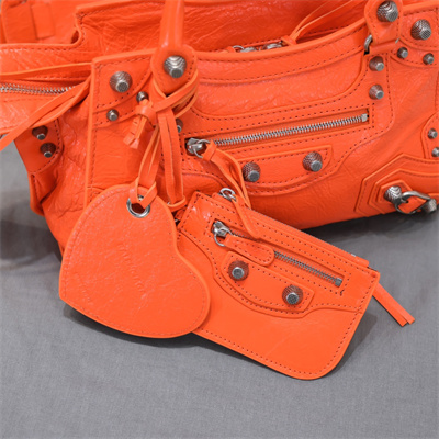 Women’s NEO Cagole XS Handbag In Arena Lambskin Orange Color