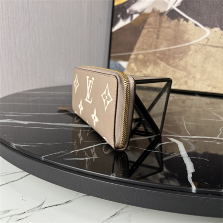 LV  Clémence Wallet Monogram Empreinte Leather Tourterelle M82338