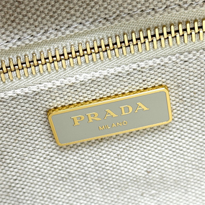 Prada Medium wicker and linen blend tote bag Tan/White 1BG835