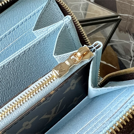 L.V  Zippy Wallet Vivienne Holidays Monogram Canvas M12223