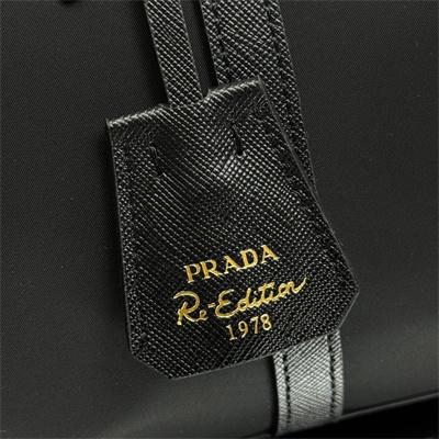 Prada Re-Edition 1978 medium Re-Nylon and Saffiano leather top-handle bag Black 1BB233