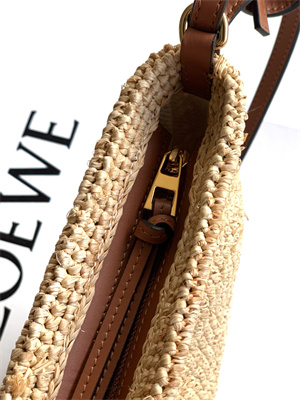 Loewe Slit pochette bag in raffia and calfskin Nature /Tan