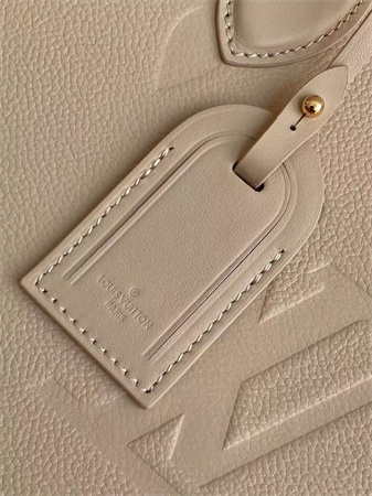 L.V ONTHEGO MM Monogram Empreinte Leather Sand M14255