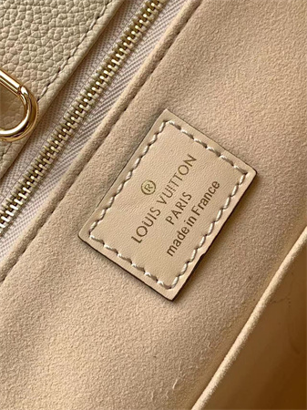 L.V ONTHEGO MM Monogram Empreinte Leather Cream color M46531